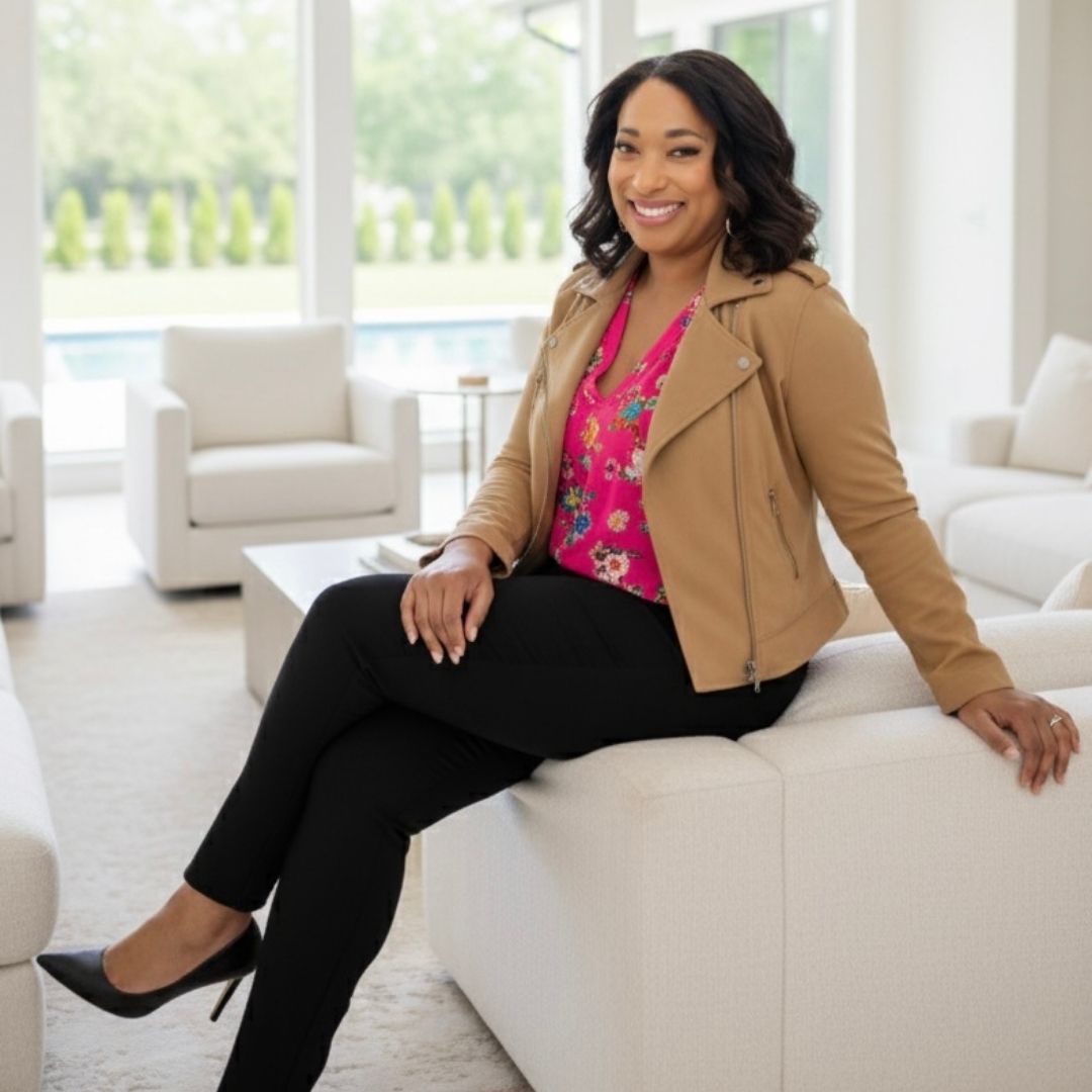 San Jose Realtor Michelle Elliott sitting in a bright, modern Willow Glen living room on Pine Ave
