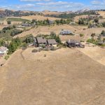 Top-down aerial view of private home, driveway, and surrounding grounds in San Jose.