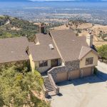 High drone perspective showing private estate and expansive land in San Jose CA.