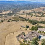 Panoramic landscape view of rolling hills and valley from San Jose property.