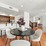 Dining room with sliding glass doors leading to private balcony