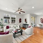 Open living and dining space with hardwood flooring