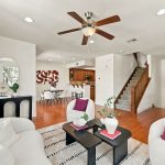 Open living and dining space with hardwood flooring